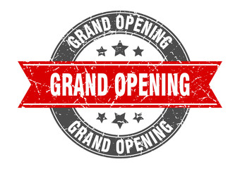 Fototapeta premium grand opening round stamp with red ribbon. grand opening