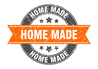 home made round stamp with orange ribbon. home made