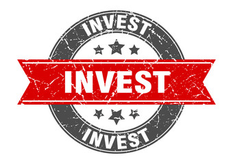 Fototapeta premium invest round stamp with red ribbon. invest