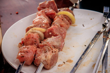 Meat skewers with onions on skewers. Charcoal meat.