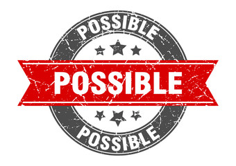 possible round stamp with red ribbon. possible