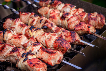 Meat skewers with onions on skewers. Charcoal meat.