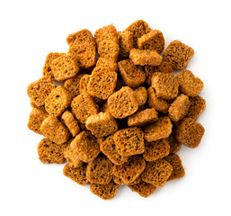 Pile of crackers to beer on a white. The view of the top.