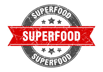 superfood round stamp with red ribbon. superfood