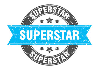 superstar round stamp with turquoise ribbon. superstar