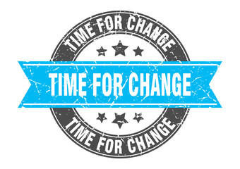 time for change round stamp with turquoise ribbon. time for change