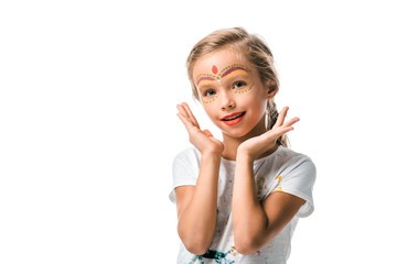 cheerful kid with face painting smiling isolated on white