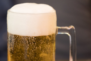 Large glasses of beer with foam close-up