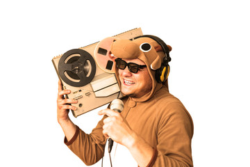 Man in cosplay costume of a cow singing karaoke isolated on white background. Guy in the animal...