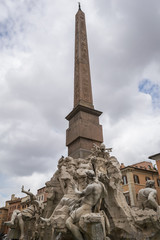 Fototapeta na wymiar Fontana dei Fiumi in Piazza Navona in Rome. Bernini's work.