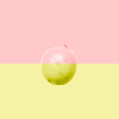 single lemon pink and yellow, graphic manipulation on minimal background