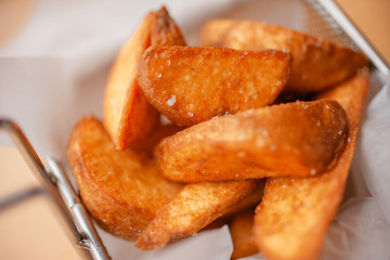 French fries on wooden table