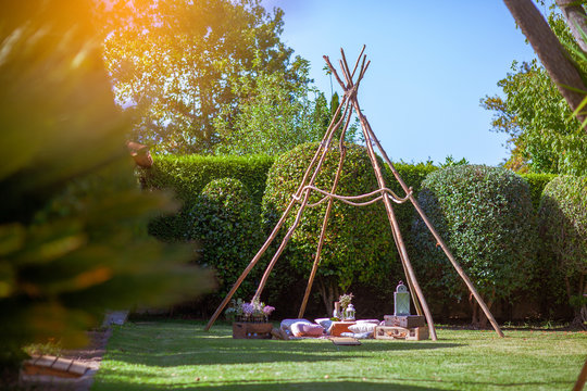 Tipi Made Of Sticks As A Wedding Decoration