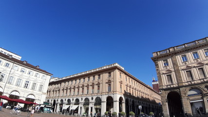 Obraz premium Torino, Italy - 10/24/2019: An amazing caption of Turin city in a beautifull sunny day. Detailed photography of the old buildings in the center of the city from the kingdom period in Italy.