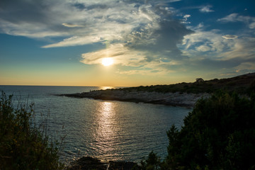 Fototapeta na wymiar sunset over island