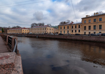 Late autumn, the center of St. Petersburg, granite embankments, colored bridges and ancient...