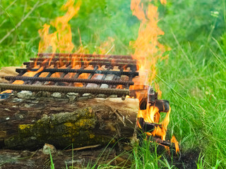 Large campfire with grill for cooking and heating food