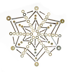 The snowflake of screws, washers, nuts and bearings on a white isolated background. Conceptual...