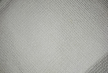 White waffle towel with led lamp on it.