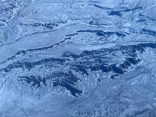 Flight Over A Snow Covered Desert Landscape 