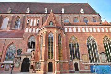 Wroclaw, Poland - May 2019. Historical building in the Wroclaw old town. View on famous tourist attraction in Vroslav. Beautiful cityscape with Wroclaw landmarks in sunny day