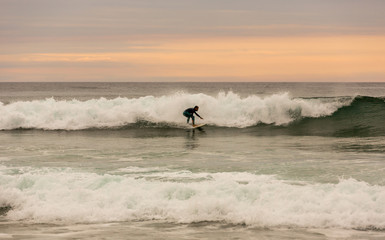 Surfer at sunset