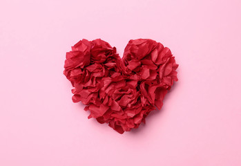 Obraz na płótnie Canvas Red heart on pink background, top view