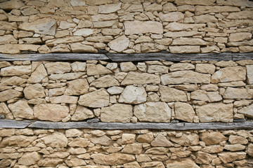 stone wall background. texture of vintage white brick wall with wooden boards
