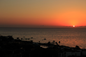 Sunset over the sea coast