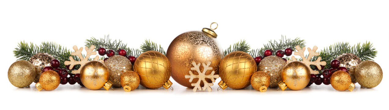 Christmas border of gold ornaments with branches. Side view isolated on a white background.