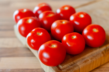 tomatoes on wooden table