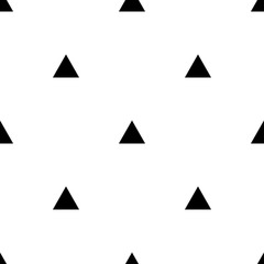 Black triangles isolated on a white background.  Seamless geometric pattern