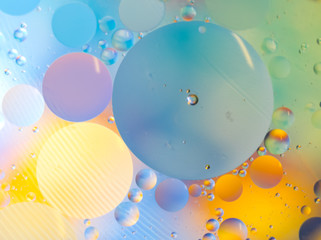 Сolorful Background Oil in Water surface Foam of Soap with Bubbles macro shot close-up