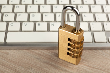 padlock with a computer keyboard Internet security concept