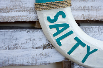 A life ring spelling the word salty makes an interesting nautical decor item.