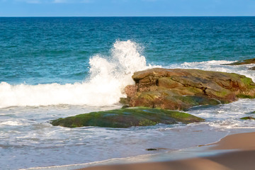 waves crashing on rocks