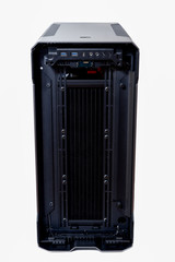 	 Open computer with water cooling system, processor, graphics card, motherboard fan Game console behind white background