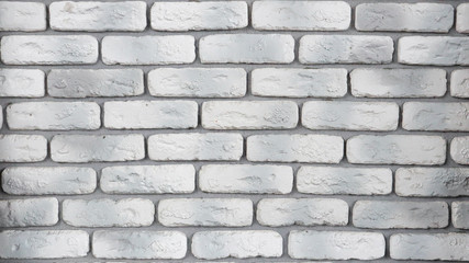 Modern white with gray brick wall texture for background. Abstract weathered texture painted with old stucco light gray and aged paint white brick wall background, grunge blocks of stone.