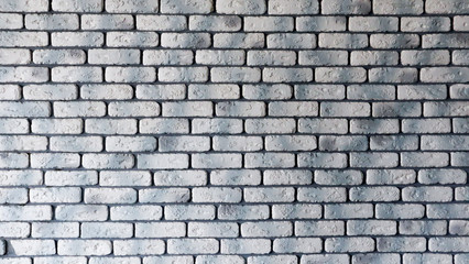 Modern white with gray brick wall texture for background. Abstract weathered texture painted with old stucco light gray and aged paint white brick wall background, grunge blocks of stone.