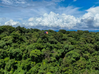 Beautiful aerial landscape view of people Parapenting in Costa Rica