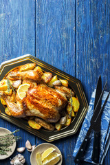 Lemon and thyme roasted chicken and various ingredients and various ingredients