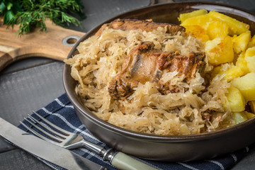 Fried ribs in sauerkraut.