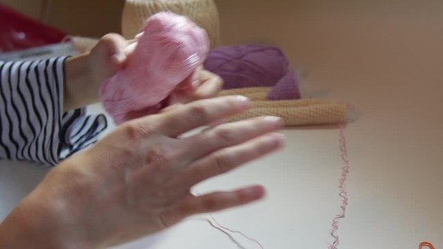 Woman's hands while Doll making