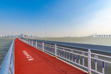 The scenery of the artificial island construction bridge at the Port-Zhuhai-Macao Bridge port in Zhuhai, Guangdong Province