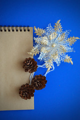Christmas card blue, merry Christmas and New year. Gray beads, Christmas ball, beautiful toy and...