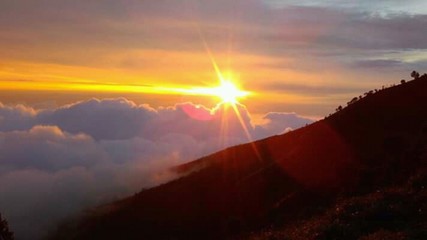 Beautiful sunrise with a sea of clouds and temple