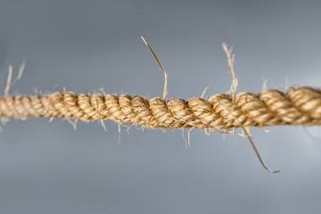 Rough strong rope on gray background