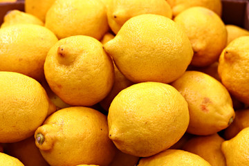 many yellow lemons for background, poster