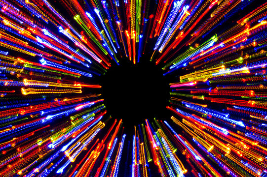 Neon lights rays, bright radial laser lights background with space for text, nightlife and party concept, disco and dancing nightclubs pattern