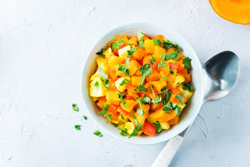 Pumpkin potato carrot stew in the bowl